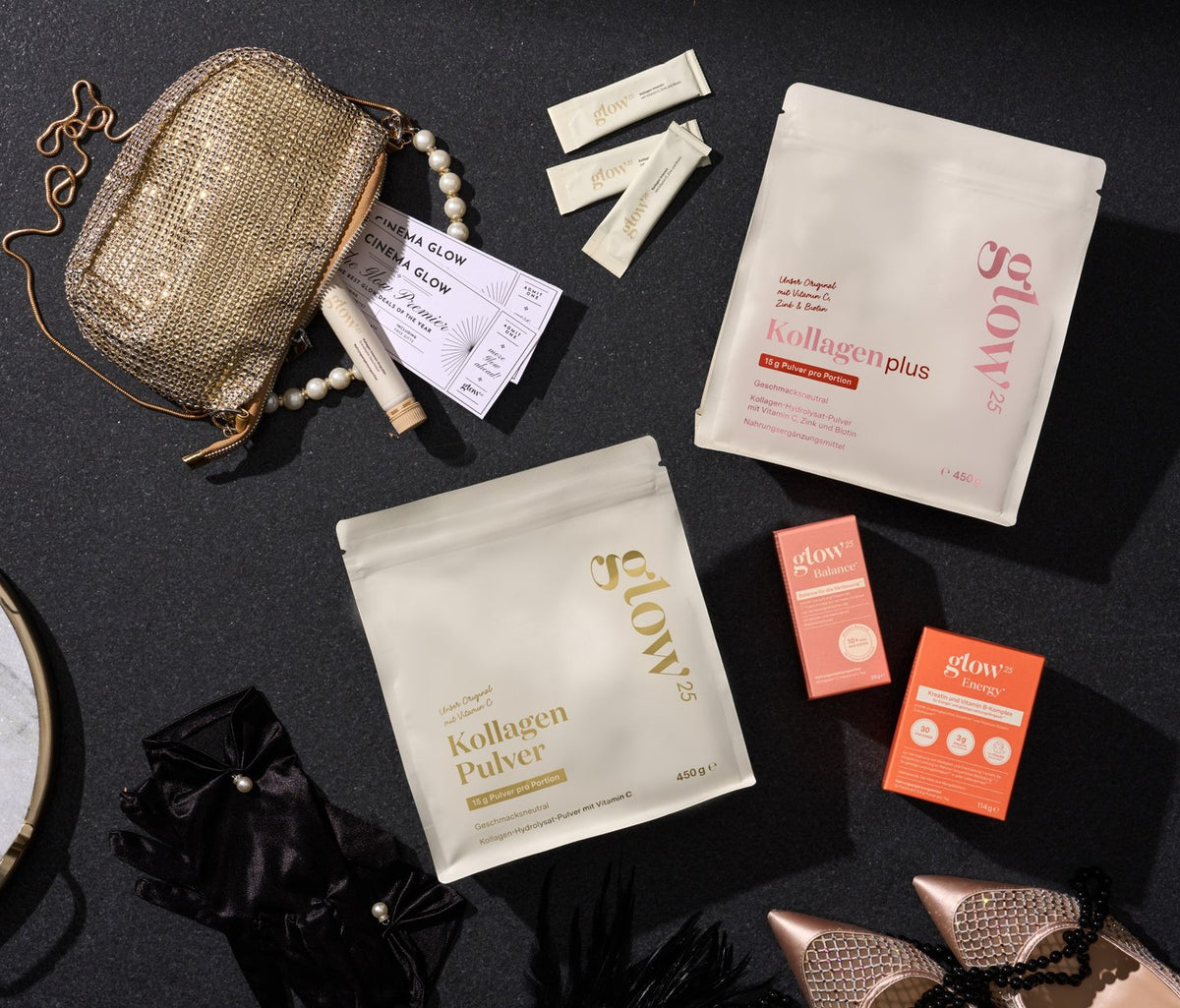Glow25 collagen pouches, sachets and an evening bag on a dark table